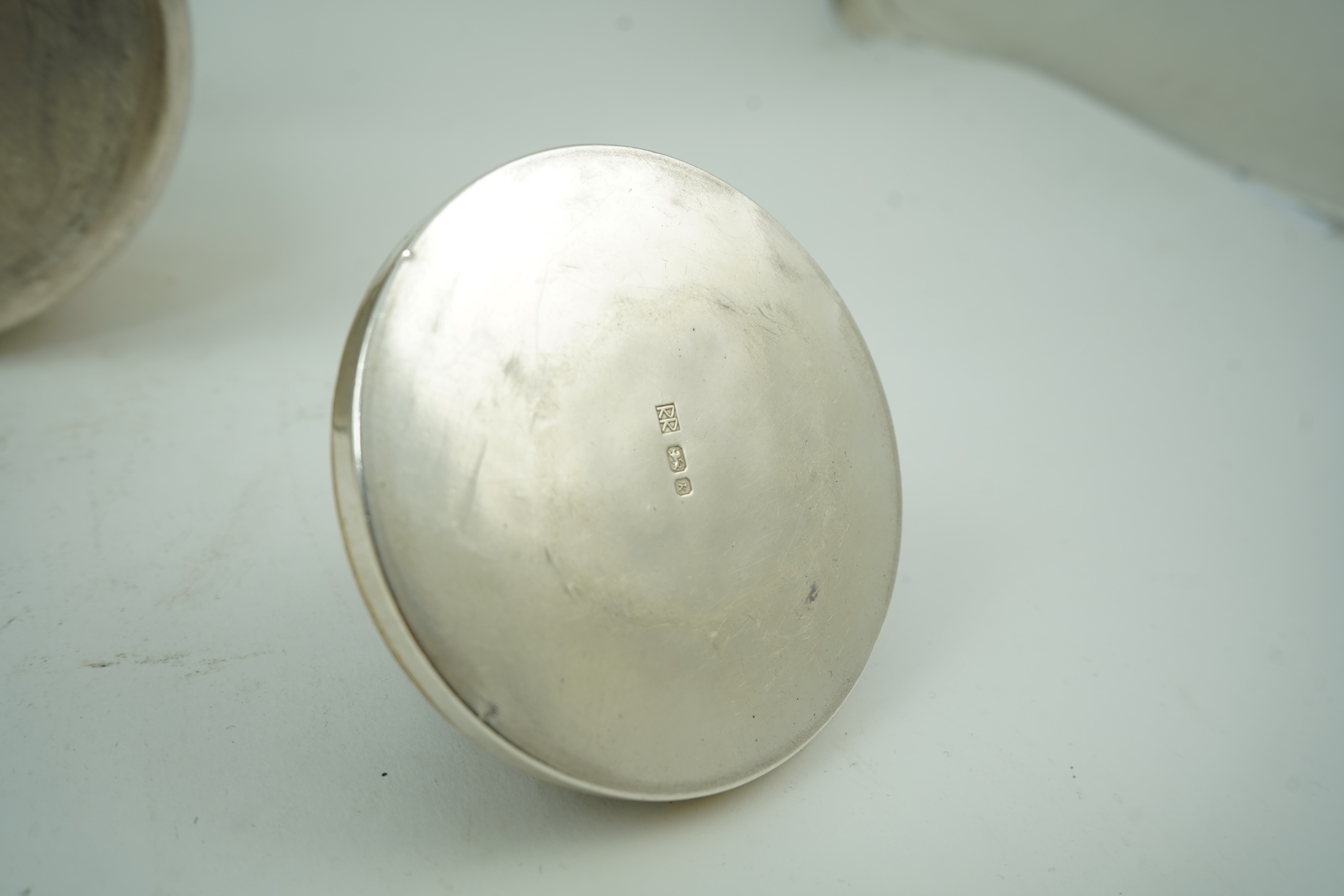 Roy Ridsdale (1942-2020): A silver tea kettle and matching cream jug